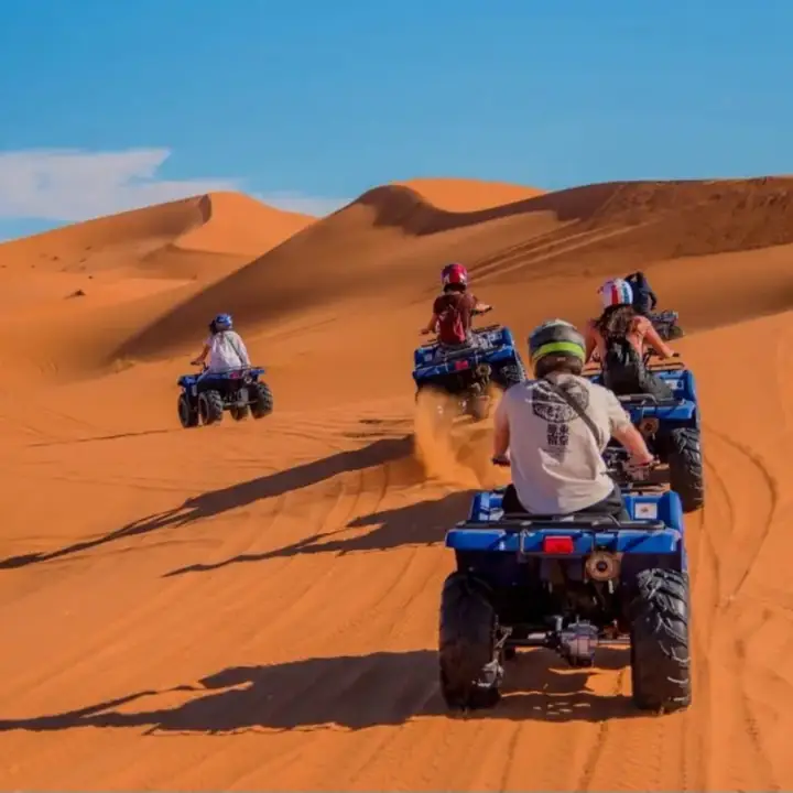 Group quad biking over the Erg Chebbi dunes
