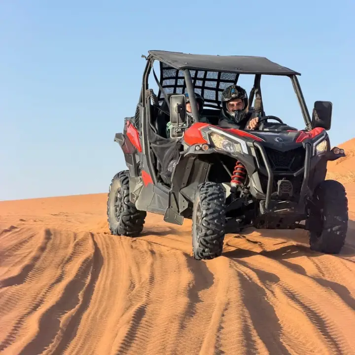 Driver in a dune buggy on the Erg Chebbi dunes in Merzouga